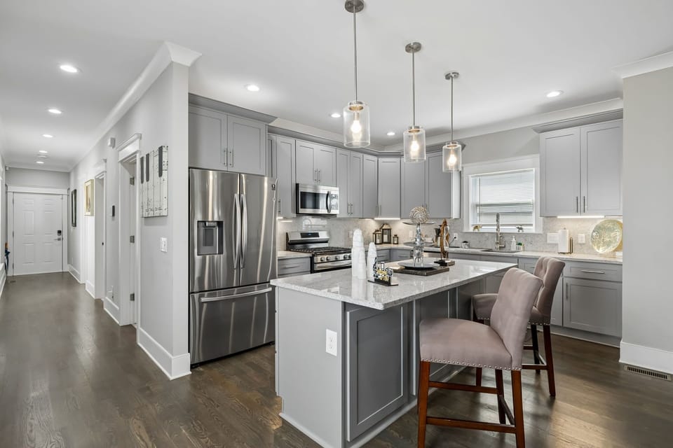 Kitchen: The fully equipped kitchen and dining area make meals easy, whether you're preparing breakfast or enjoying dinner together. Features modern appliances, ample counter space, and comfortable seating.