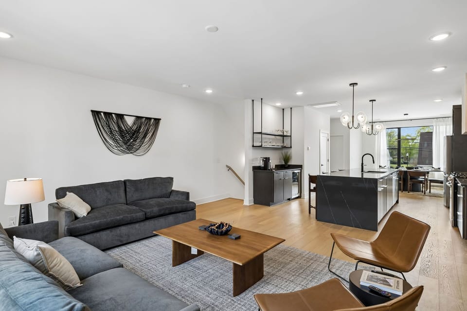 Living Room: A bright living room with natural light and a relaxing layout.
