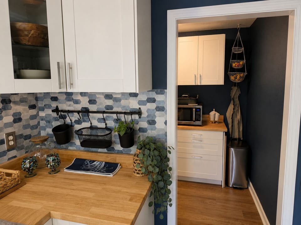 Convenient coffee and prep station with counter space, small appliances and everything close at hand.