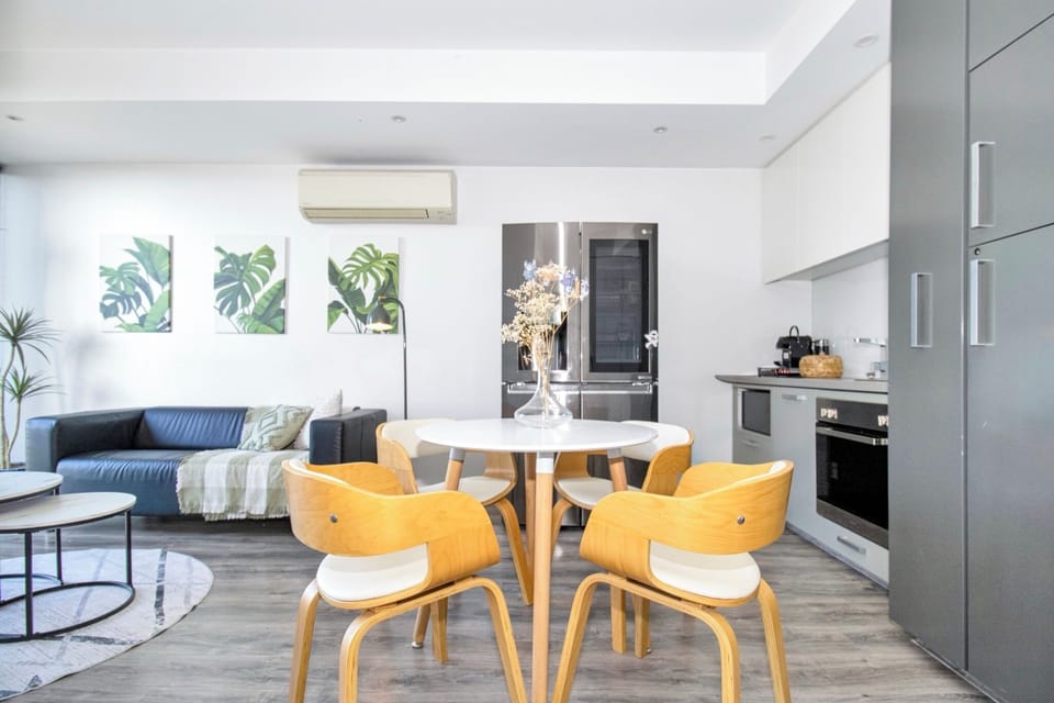 Bright open-plan living with modern kitchen and stylish dining area