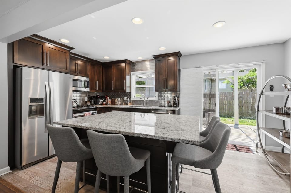 Cook, connect, and dine together in a modern kitchen in the heart of Waldo Kansas City.
