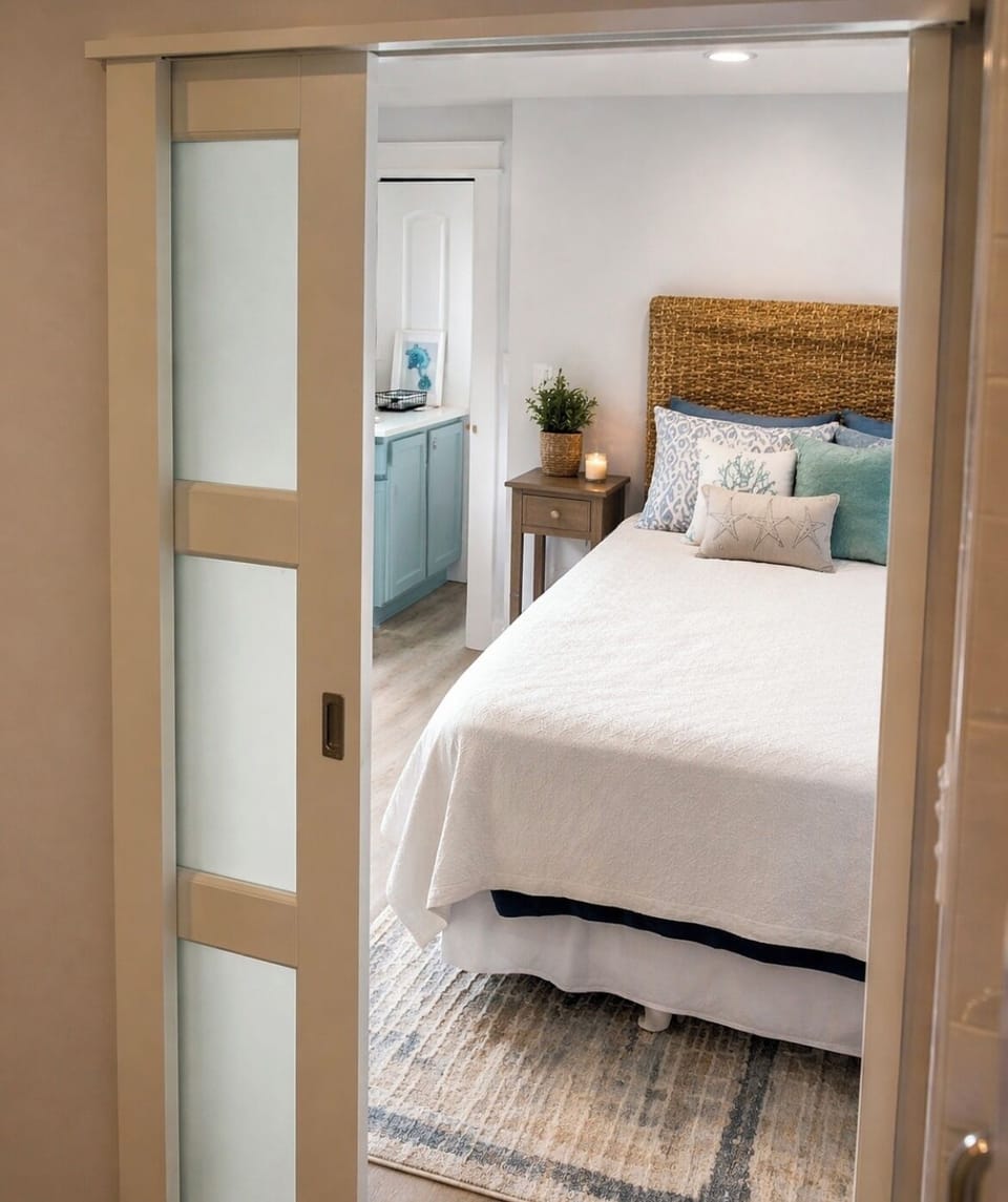 Step through your private en suite entry into a calm, coastal-inspired space designed for easy, comfortable stays.