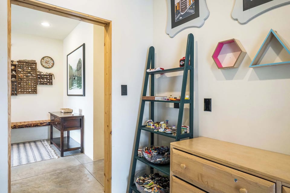 A fun nook stocked with games and toys for kids