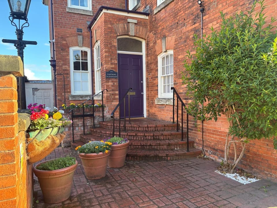 Here is the front door with our nice flower display