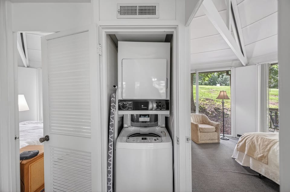 Your convenience is covered with in-unit laundry tucked neatly away, making it easy to refresh your wardrobe during your stay while enjoying the bright, peaceful surroundings.