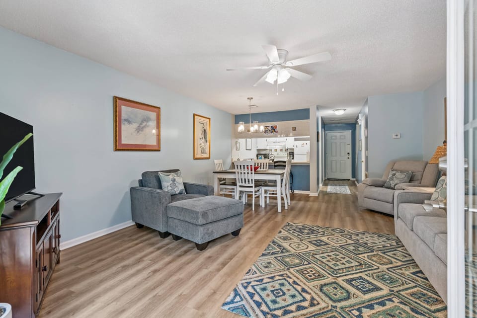Enjoy this comfortable couch and two large lounge chairs during family game night or movie night!