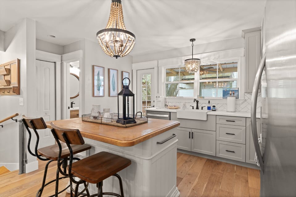 The beautiful updated kitchen is fully stocked and has everything your family needs during your stay.