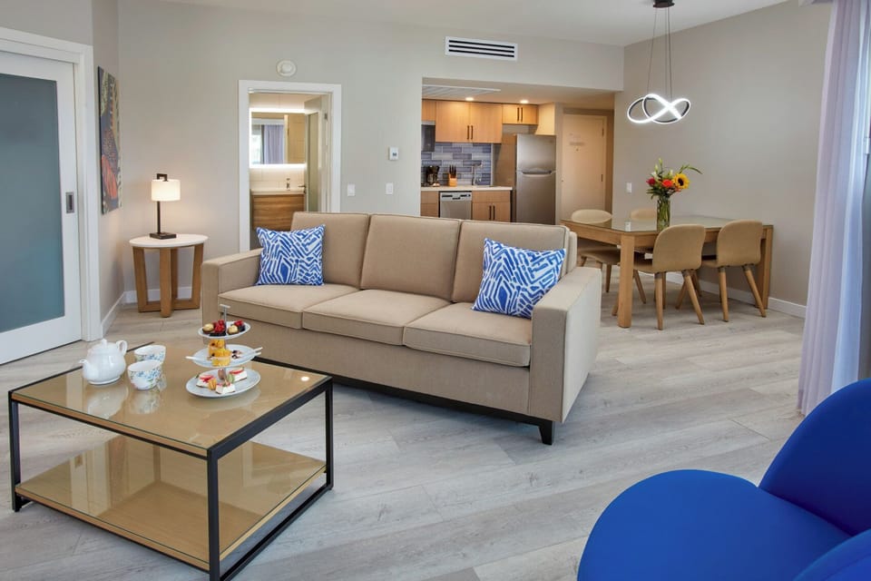 Gather for cocktails in a spacious, sunlit living area.