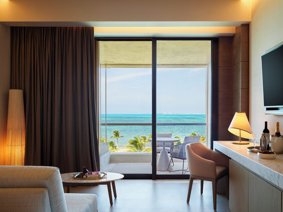 Wake up to ocean views from bed and private balcony.