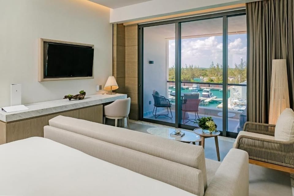 Sip morning coffee while gazing over the sparkling marina view.