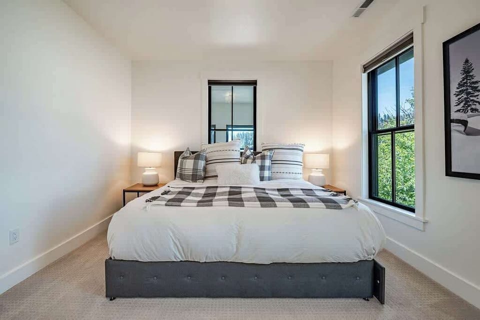 Bedroom 4: King bed with ensuite bathroom located on the upper floor