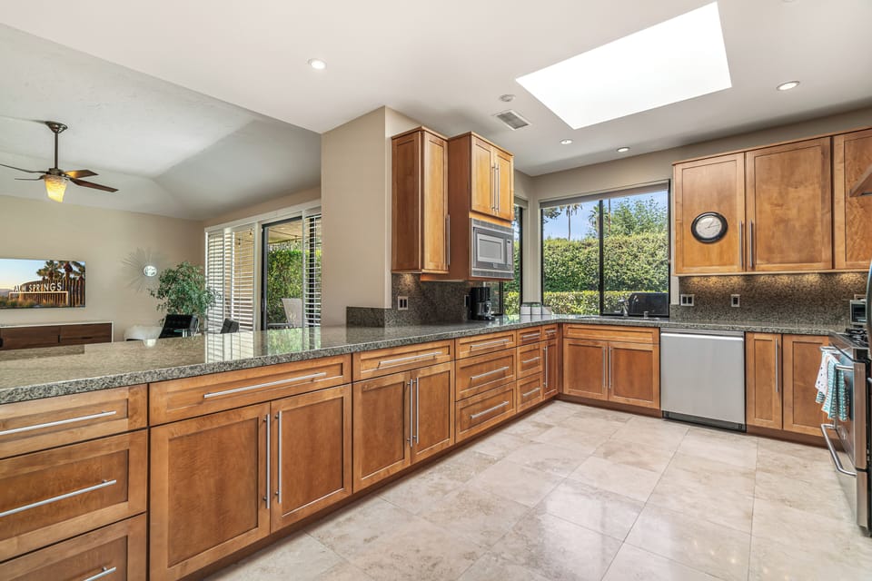 Large kitchen with all stainless steel appliances 