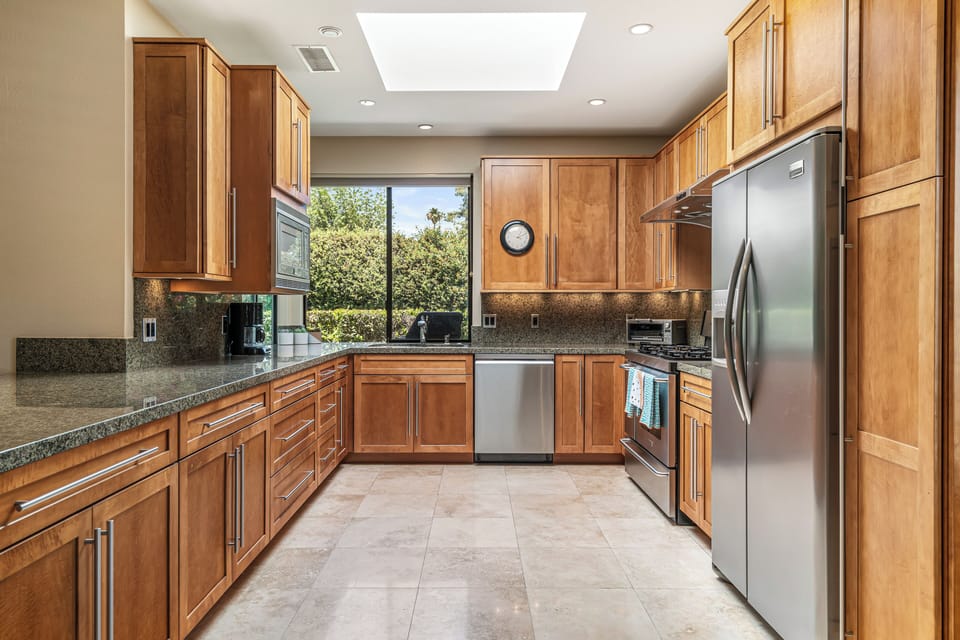Large kitchen with all stainless steel appliances 