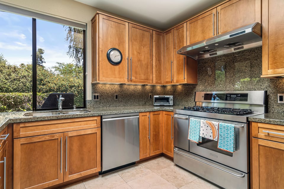 Large kitchen with all stainless steel appliances 