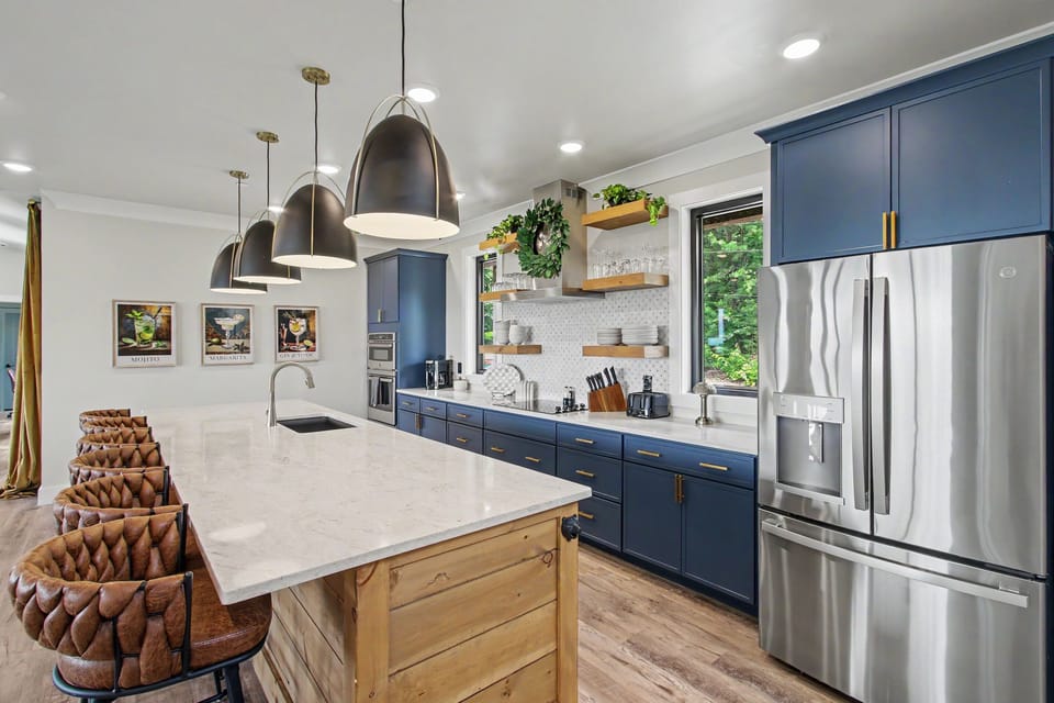 Fully equipped chef's kitchen with premium finishes and plenty of space to gather!