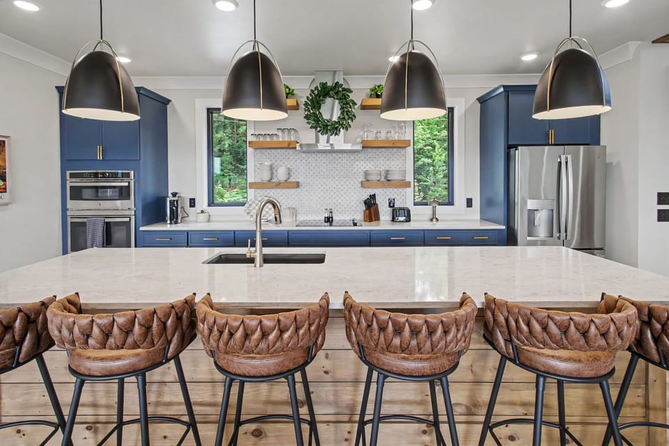 Oversized island seating makes mornings, meals, and conversations easy.