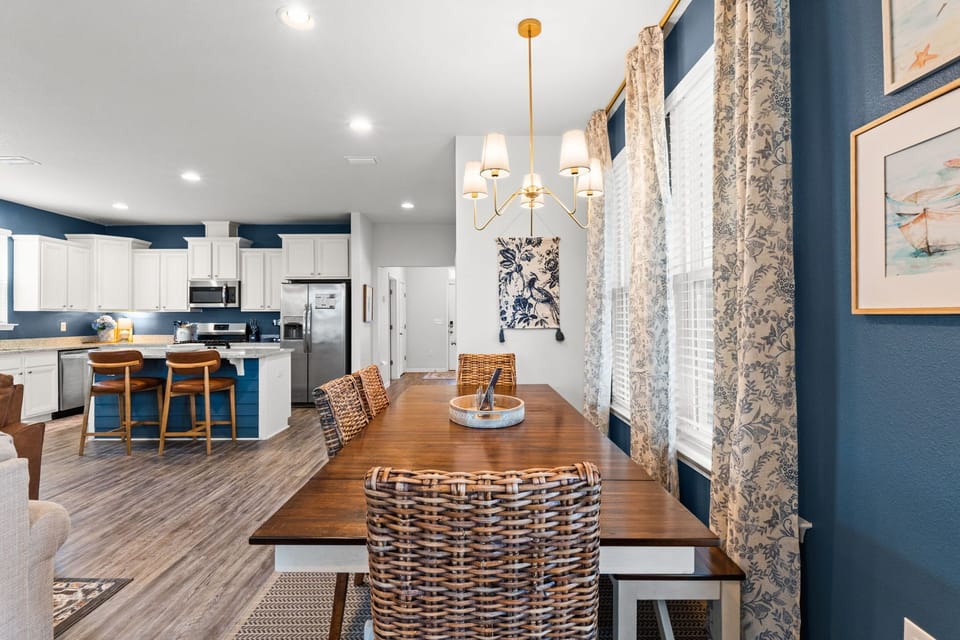 Bright open dining area with stylish kitchen and island seating