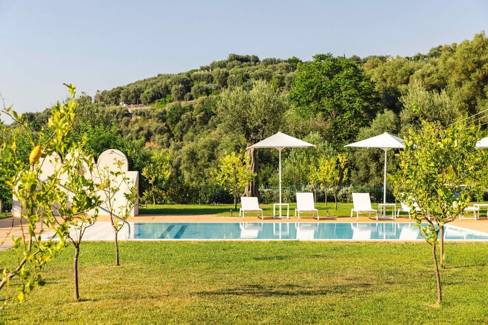 Amenities, Building Exterior, Garden, Outdoor, Pool, Spring, Summer