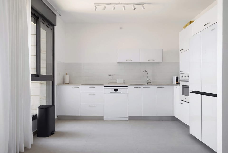 A brilliant layout provides ample room for family meal preparations after visiting local neighborhood hotspots.