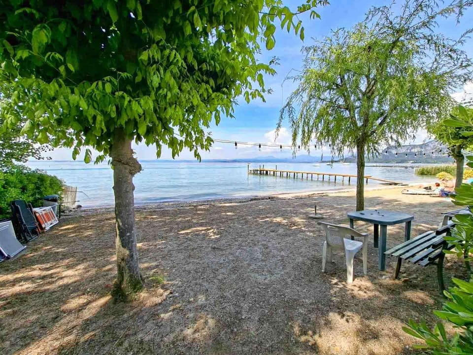 The private beach across the residence you can easily reach in 2 minutes from the apartment. We provide 2 portable sun loungers.