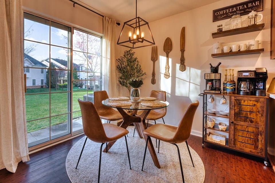 The kitchen dining table offers seating for four guests close to your own personal coffee bar where you can start your day.