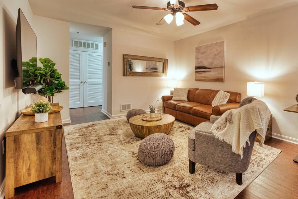 The spacious living room offers seating for everyone. The poufs can be used for seating or they can provide much-needed rest for tired feet after a day of sightseeing. A 65-inch Roku TV with Sound bar offers entertainment when you want to rest.