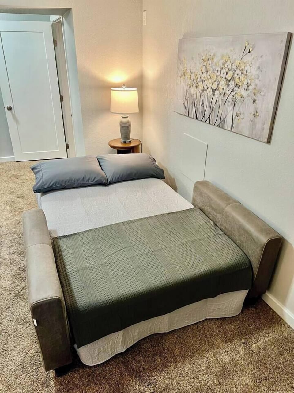 couch unfolds, becomes a sleeping area for 2 kids or 1 Adult 