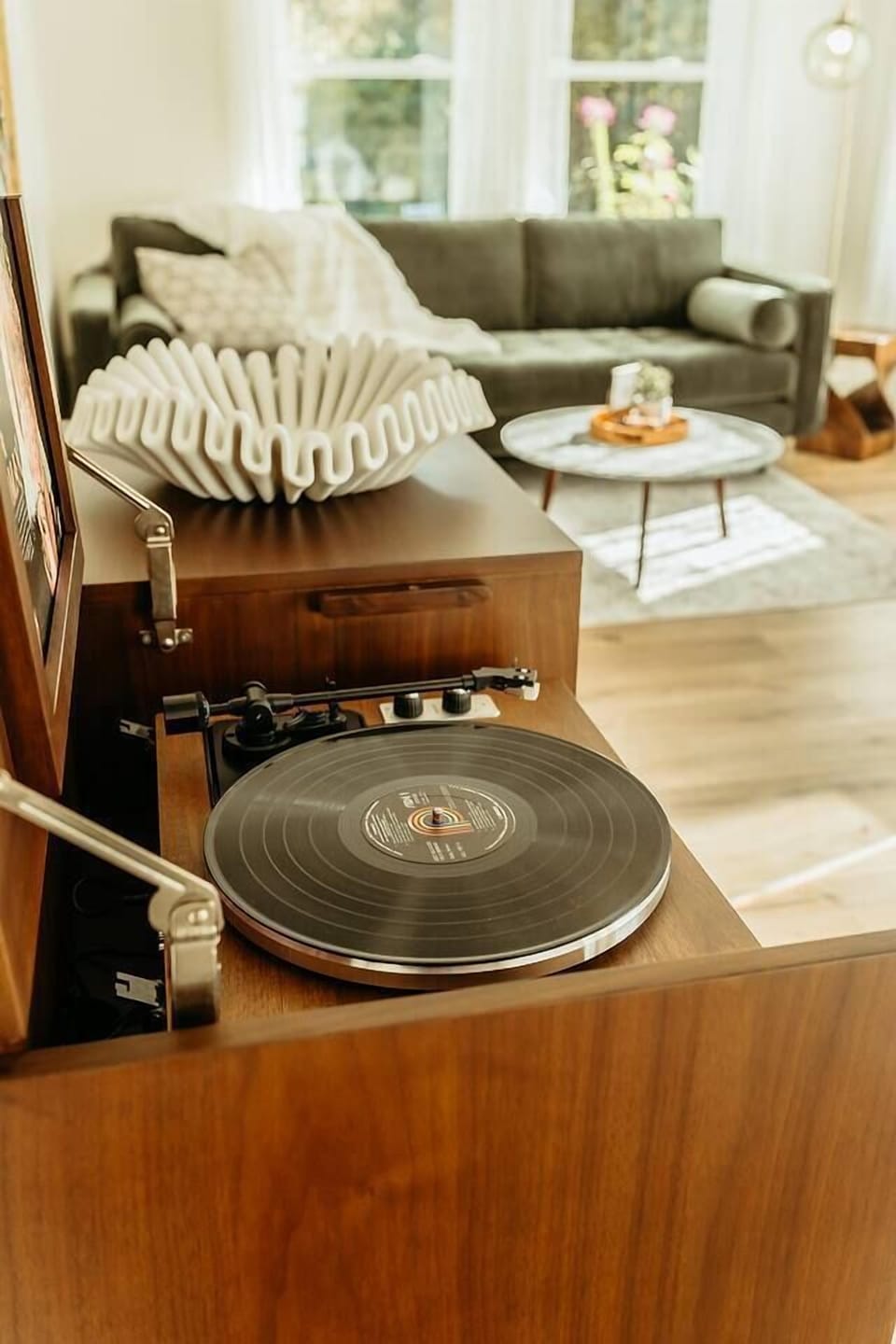 The sounds of the vinyl record playing will evoke a sense of nostalgia and transport you to yesteryear, when life seemed slower and simpler. 