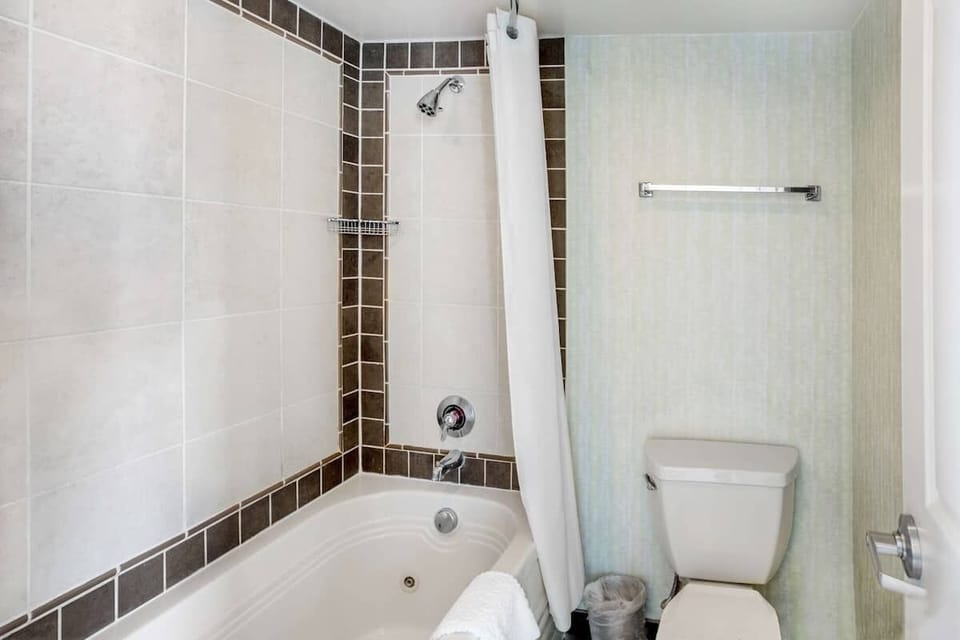 Rinse off and relax with a clean tub-and-shower combo.
