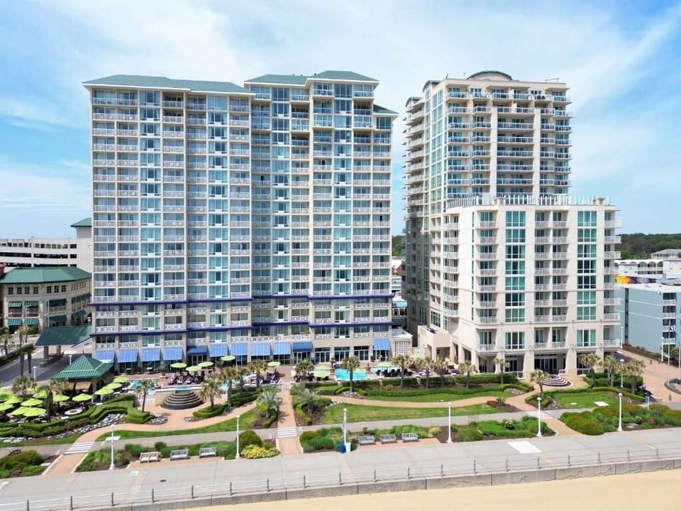 Take in the full resort layout and landscaped pool courtyard.
