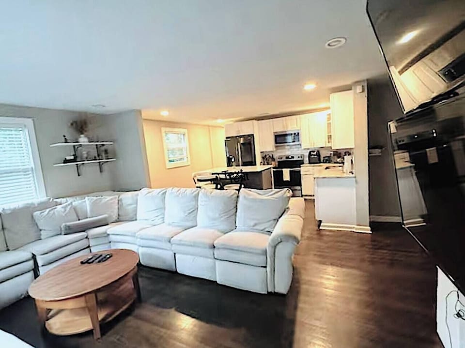 Comfortable living area with ample seating for the whole group to gather.