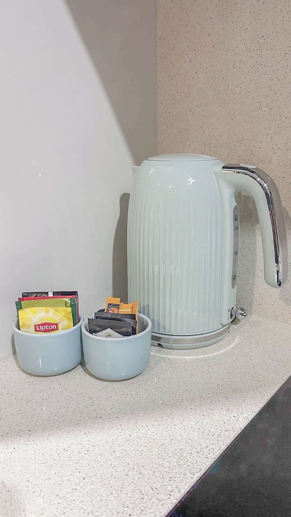Enjoy complimentary tea and coffee amenities paired with a modern electric kettle for a quick, comforting drink at any time of day.