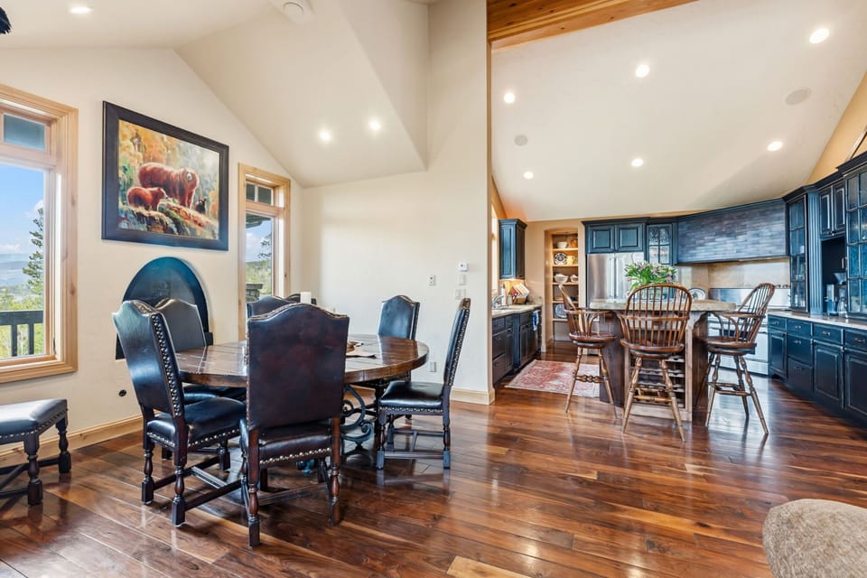 Plenty of room for the whole crew — the open dining area flows seamlessly into the kitchen and living spaces, perfect for group gatherings and long, leisurely meals.