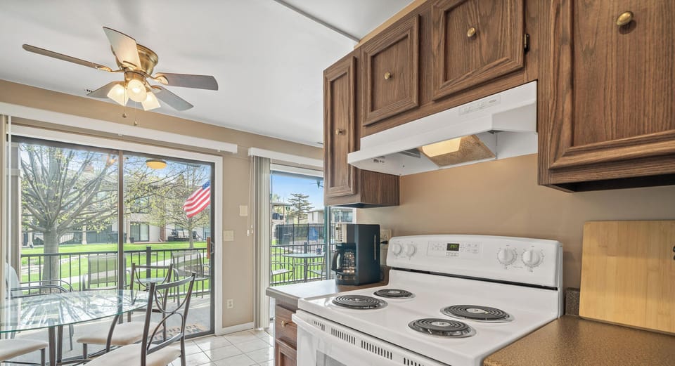 Electric stove with coffee maker. Start up supply of coffee provided.