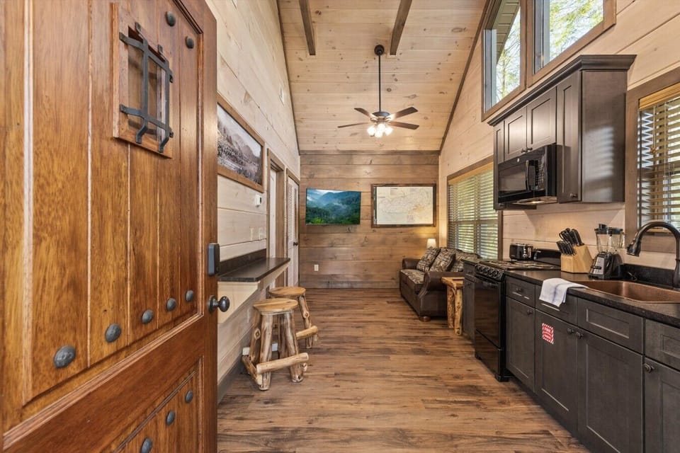 Full kitchen with stove, refrigerator, drip coffee maker