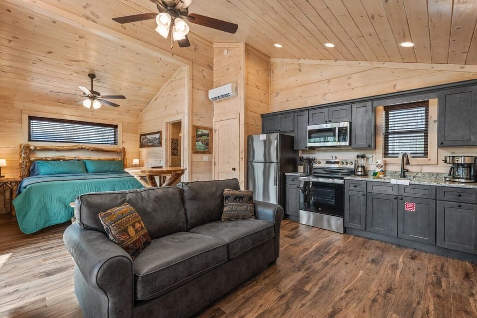 Full kitchen with stove, refrigerator, drip coffee maker