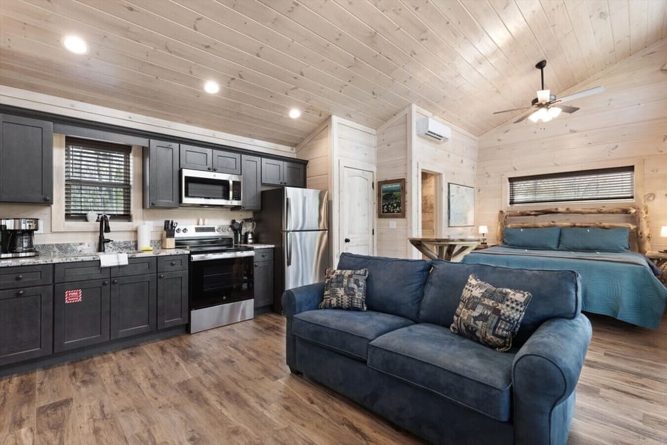 Full kitchen with stove, refrigerator, drip coffee maker