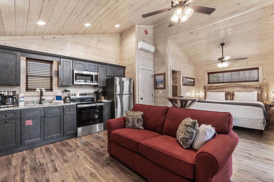 Living space with full kitchen, smart tv, dining, electric fireplace