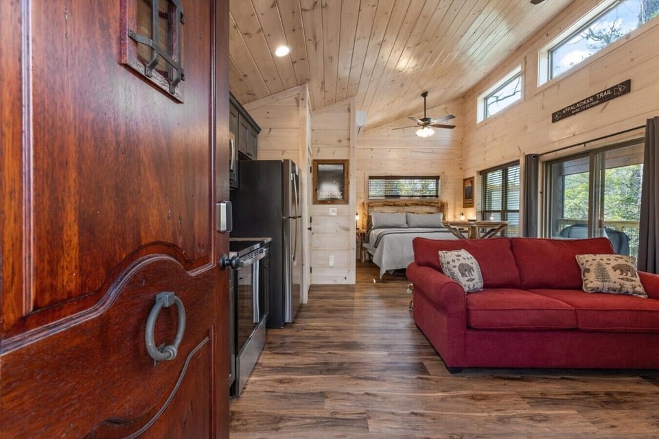 Living space with full kitchen, smart tv, dining, electric fireplace