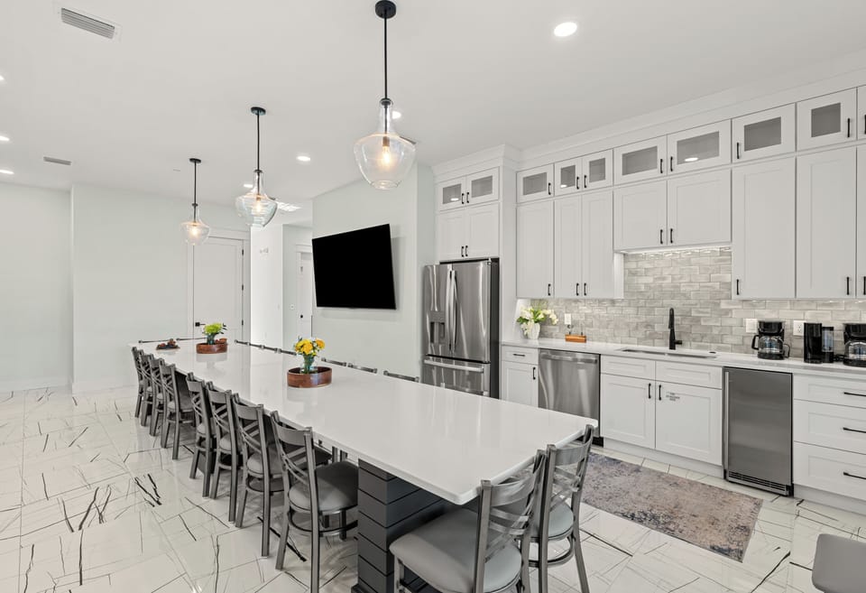 A closer look at the extensive island bar seating, perfect for hosting large groups.