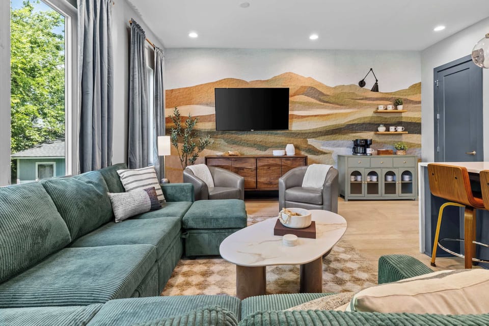 The full depth of the sectional and mural wall on display. Plenty of seating for a full group without it ever feeling crowded. — The Iron Horse
