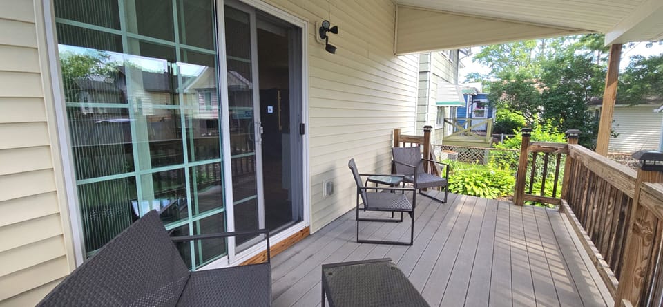 Covered deck in backyard.