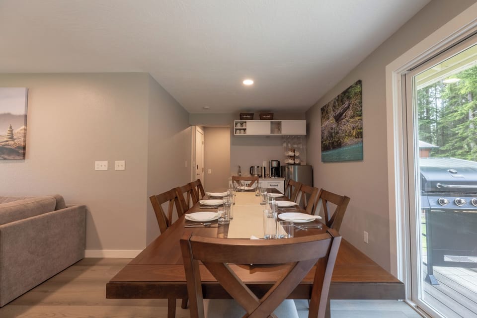 Large dining table for group meals, right next to the coffee & beverage bar!