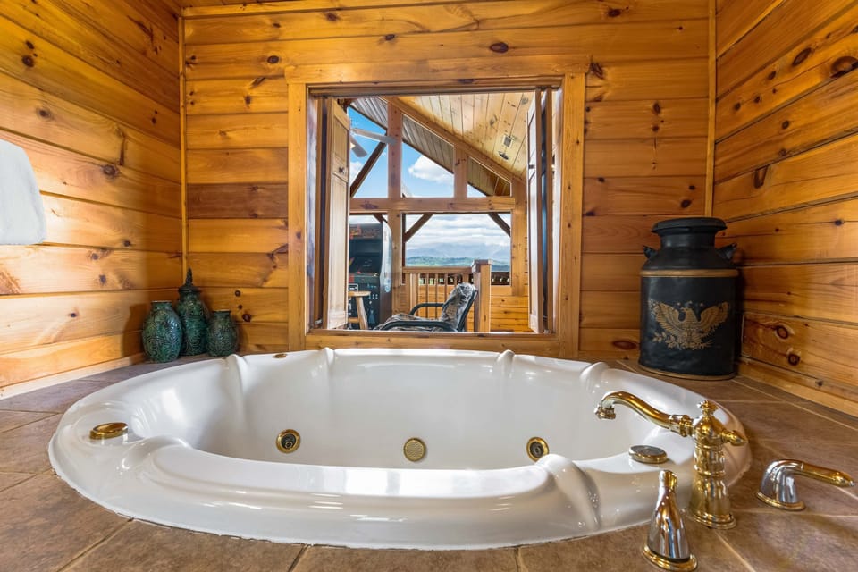 Luxurious Hot Tub Retreat, unwind in the jetted tub with stunning mountain views through the window!