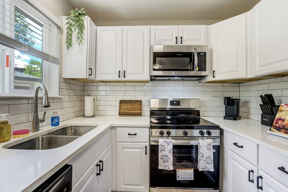The updated kitchen is fully equipped for both short and extended stays and includes a Keurig coffee maker to help start your mornings right.