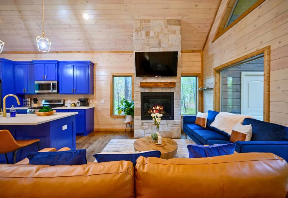 Whether you're sharing stories by the fireplace or watching a favorite movie, the living room was designed with comfort in mind.