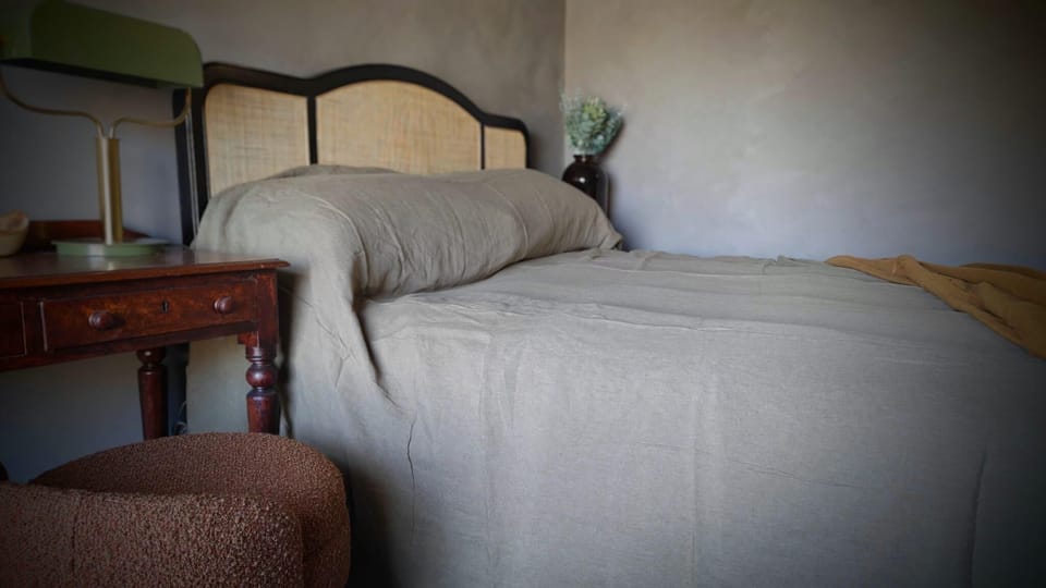 A cosy, well-appointed room overlooking the market square, perfect for a relaxing stay.