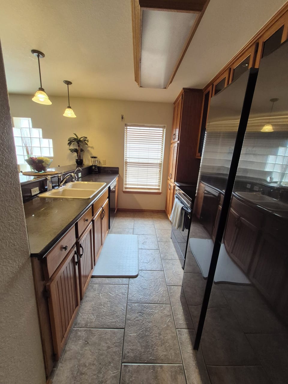 Galley kitchen opens to the main living area with all of the standard amenities