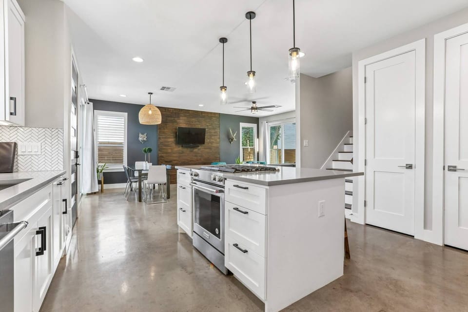 Gourmet Kitchen with oven, microwave, gas stove, refrigerator with ice maker and filtered water, toaster, blender and coffee maker