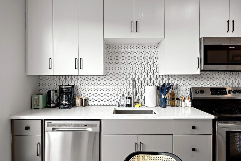 Modern kitchen with sleek cabinetry, full-size appliances, and everyday essentials.